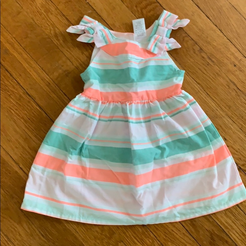 Adorable party dress with bows and stripes